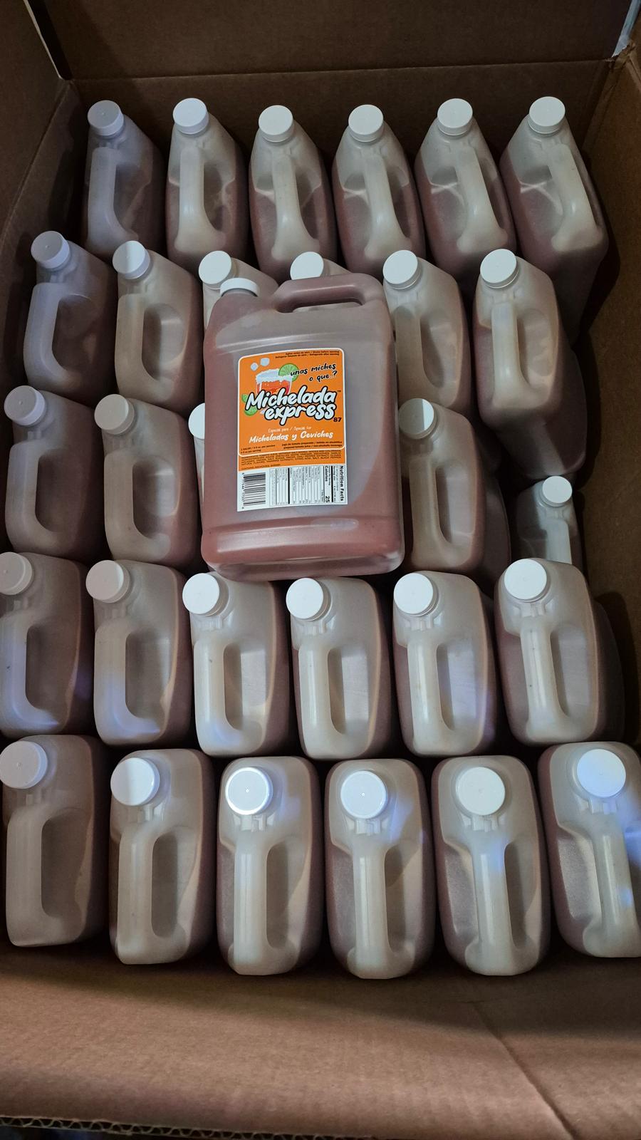 Caja llena de galones de Michelada Express 87